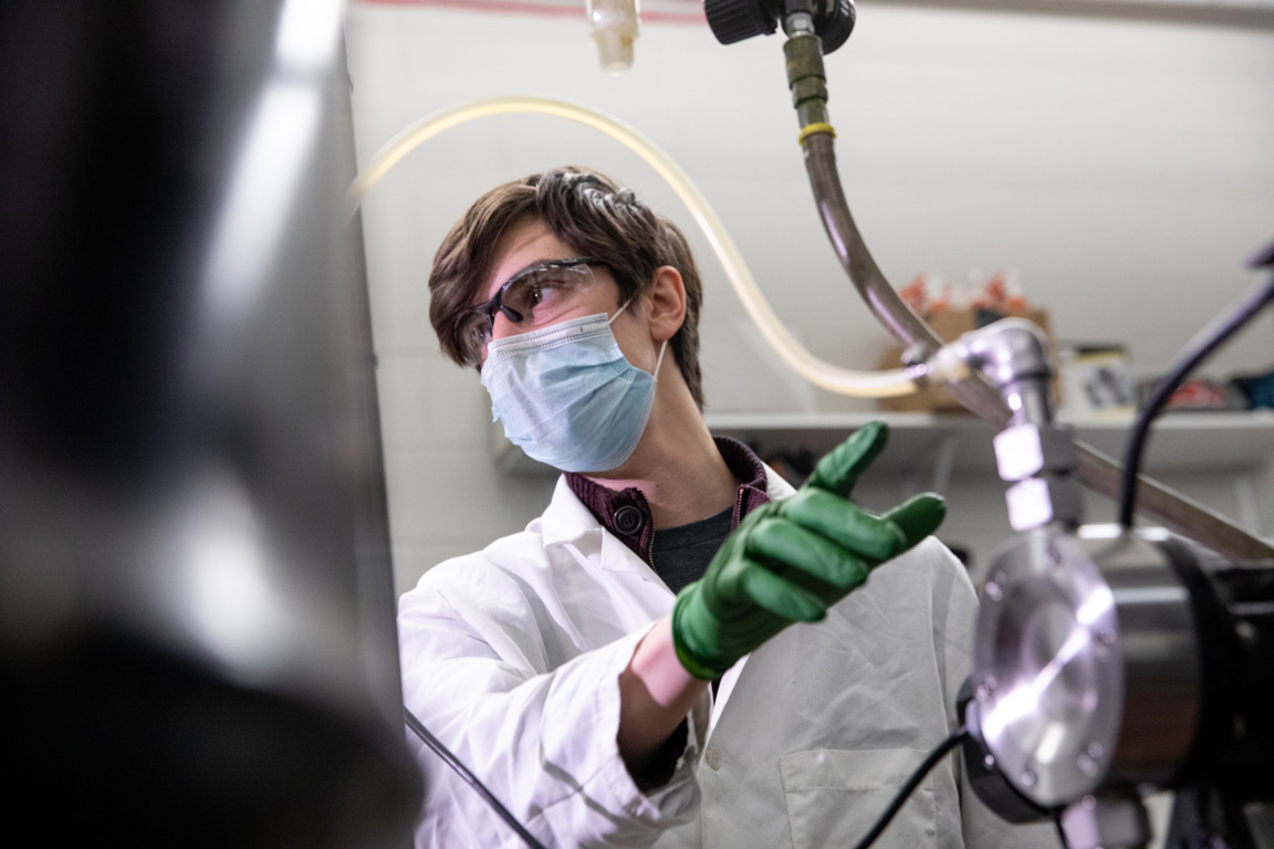 Student in biodiesel production lab.